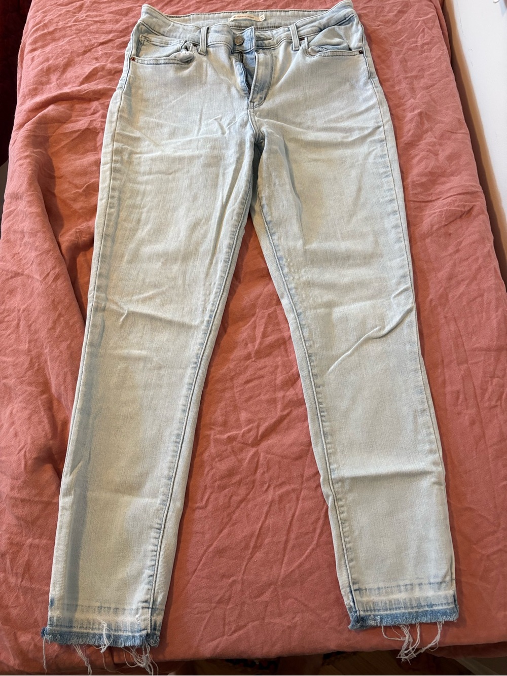 Levi's High Rise Light Blue Skinny Jeans with Frayed Hem